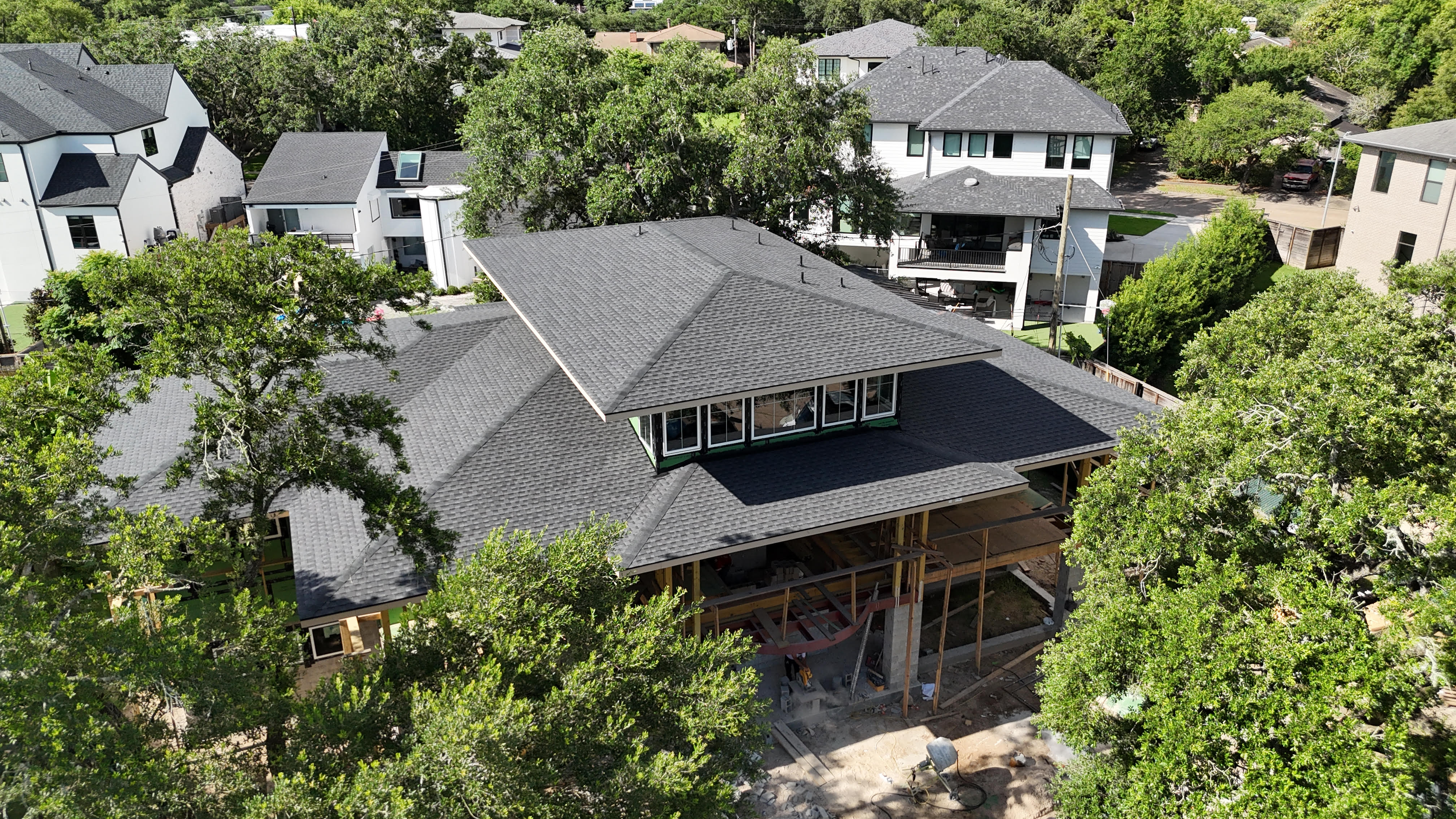 Aerial view of a Black Rock Roofing new construction residential roof in Houston