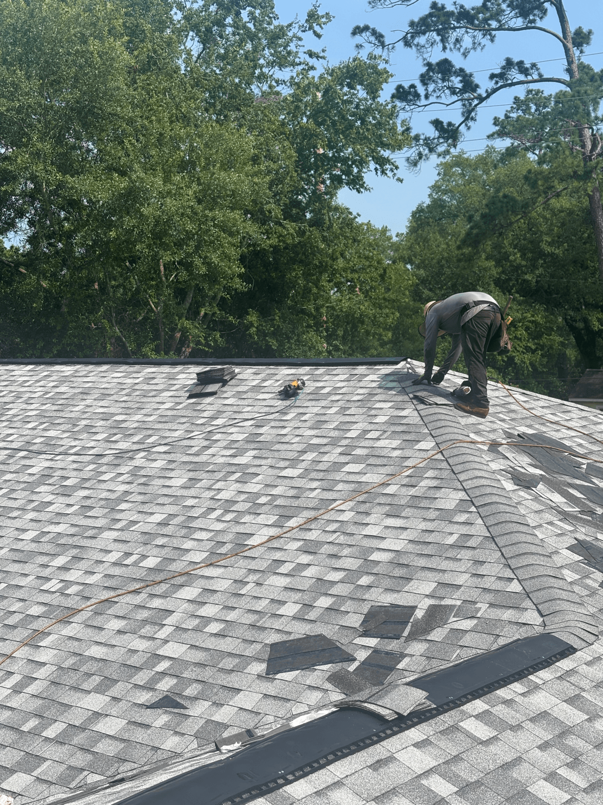 Residential roof repair worker 2
